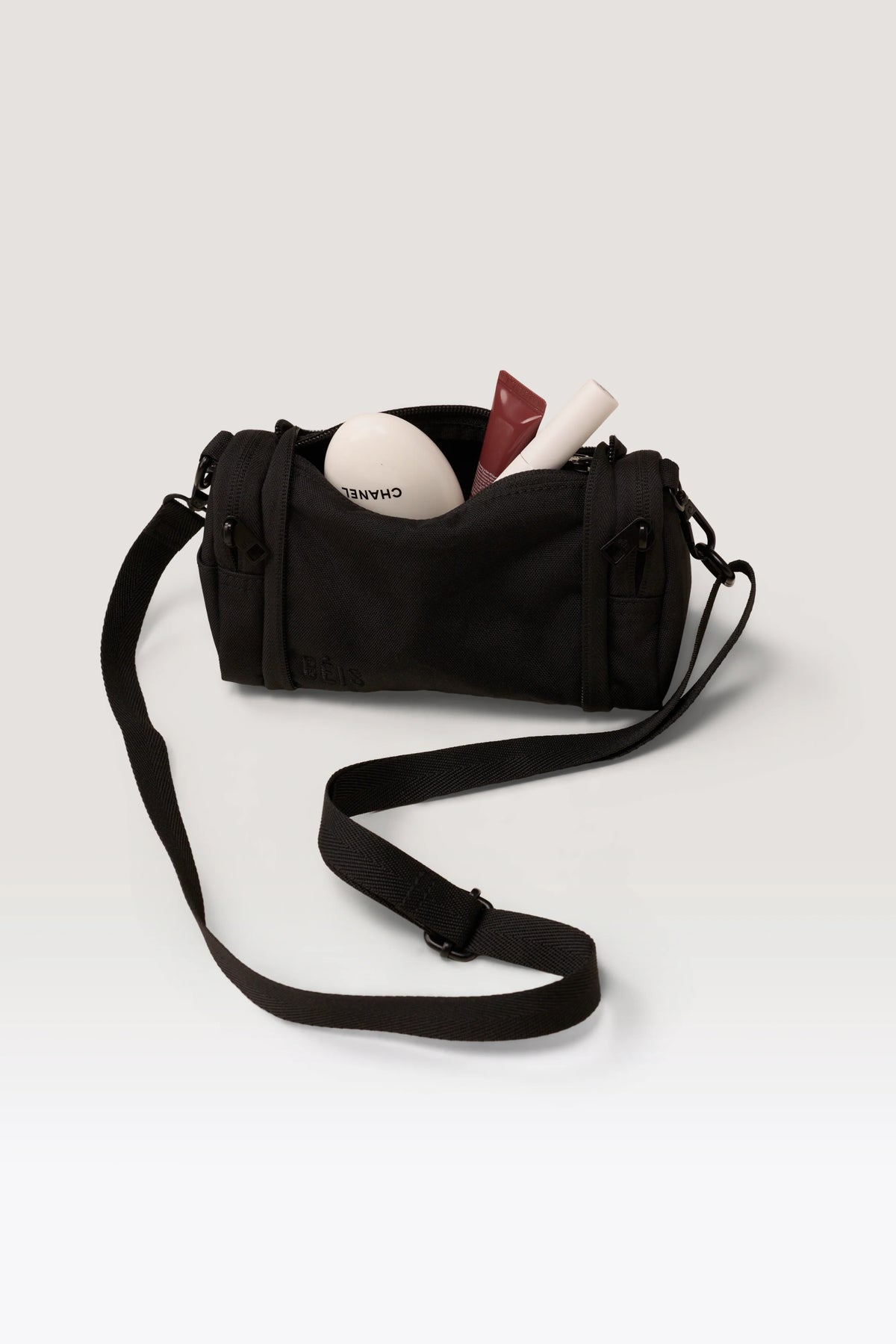 The Expandable Crossbody Charm in Black